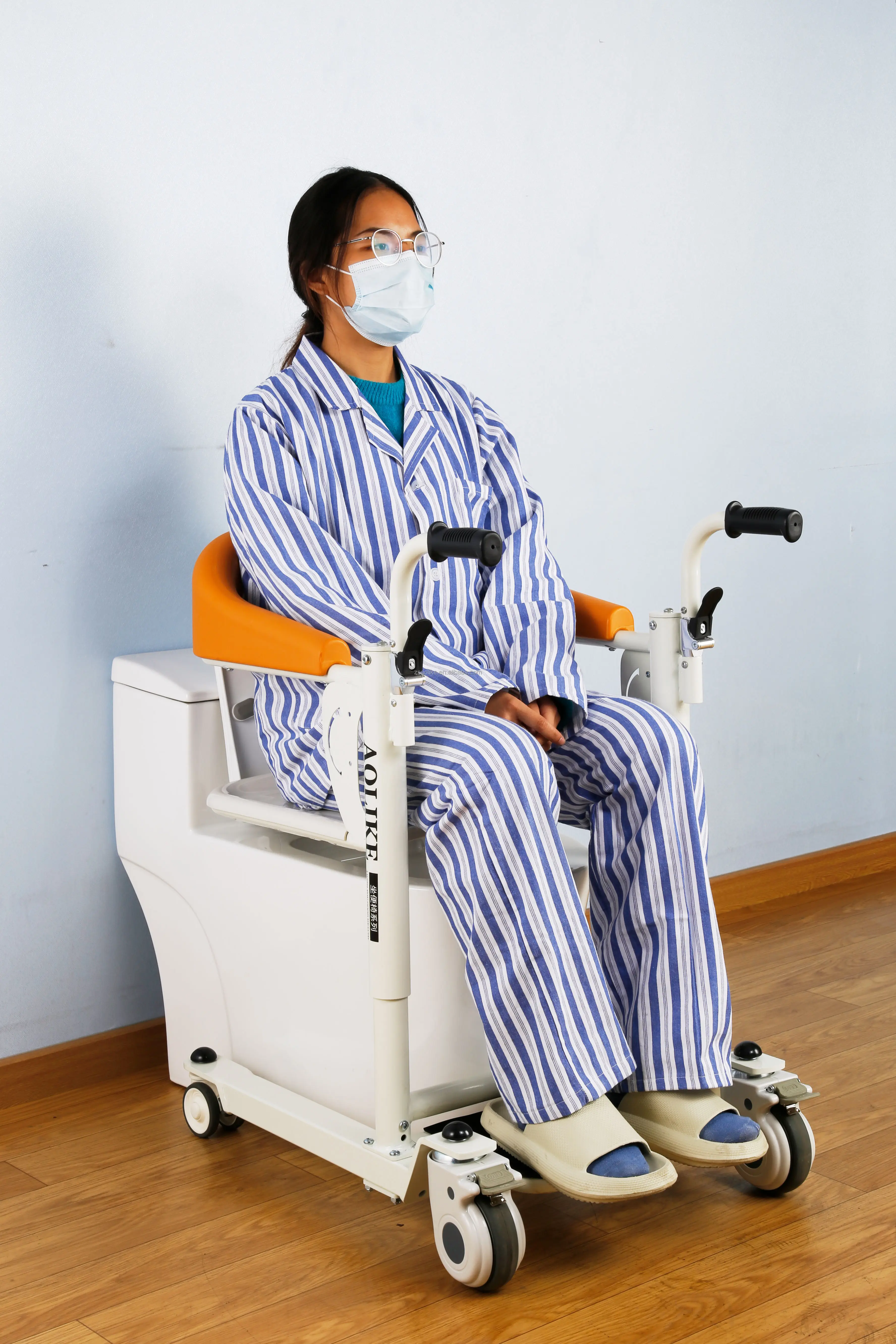 Hot Sale Movable Nursing Adjustable Control Manual Rehabilitation Patient Transfer Commode Chair for Elderly