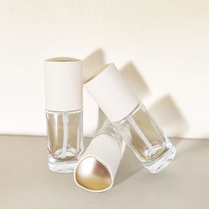 Wholesale 30ml Clear Frosted Triangle Glass Bottle Pump Comfortable Eye Drop Wholesale Oval Glass Bottle Rubber Paint Treatment