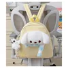 Yellow backpack charm