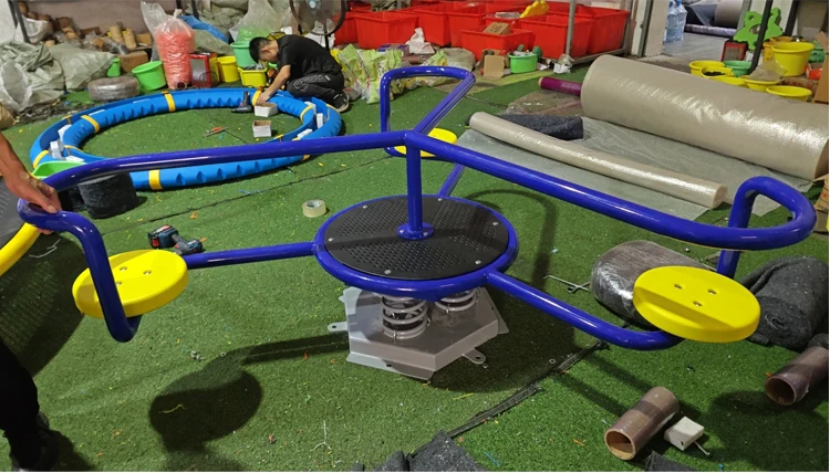 High-quality children's spring seesaw with safety guards, designed for outdoor playground equipment.