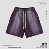 pantalones cortos morados