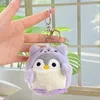 Pingüino travesti morado + hebilla plateada
