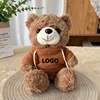 Felpa marrone con orsetto di peluche e curry