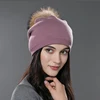 Purple with brown pom