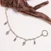 Skull and teeth shoe chain