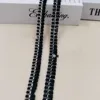 12cm black bg gold/silver threads 100yd
