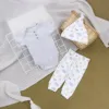Vêtements bébé boutons gris