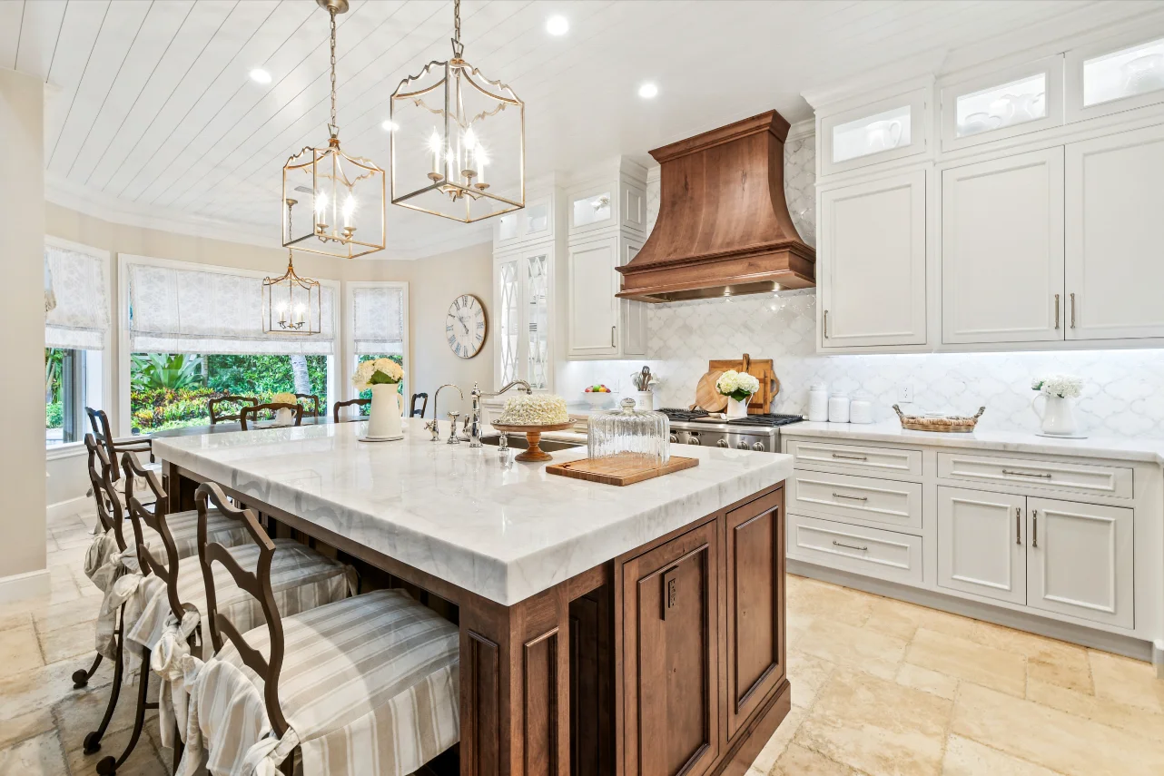 Gorgeous French Country Style Kitchen Design Featuring a Rustic Cherry Hood With Coordinating Island and White Inset Cabinetry