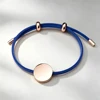 Cordoncino blu + ciondolo in oro rosa