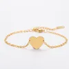 Pulsera de cadena con cruz y corazón con agujero interior dorado