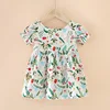 Red flower and green leaves dress