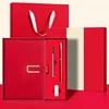 Rojo chino + núcleo de bolígrafo + bolígrafo de metal + unidad flash USB + bolsa de caja de regalo