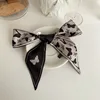 Foulard en soie papillon rose et noir