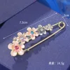 White flower brooch