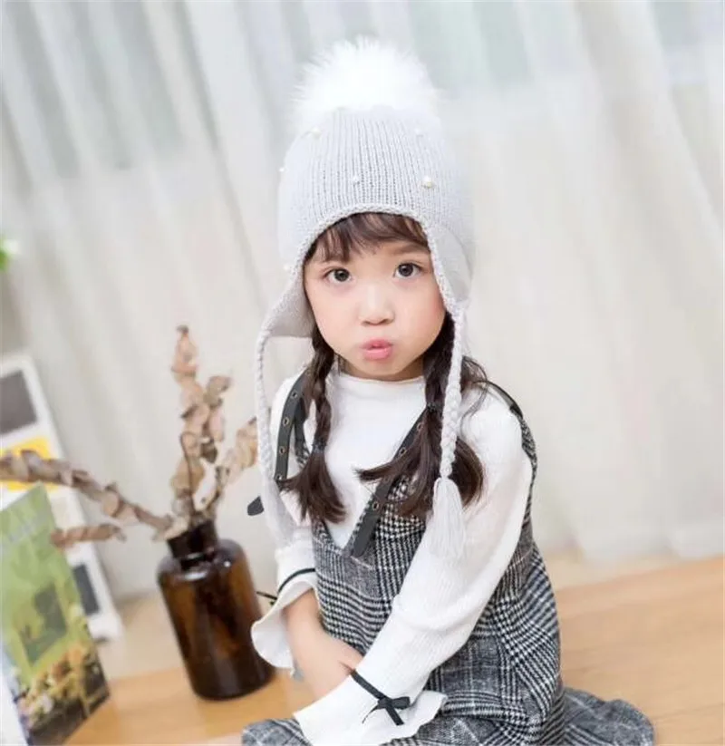 Chapeau D Hiver Avec Pompon En Fourrure Pour Enfants Bonnet Tresse En Perles Accessoire Pour Bebe Fille Et Garcon Ideal Pour L Hiver Offre Speciale Buy Musulman Chapeaux Tricotes Enfants Jazz Chapeau D Hiver Pompon Chapeau Couleur Unie