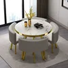 Mesa blanca+silla gris oscuro/dorada