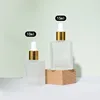 Frosted bottle  with gold dropper head