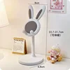 Supporto per telefono a forma di coniglio (bianco)