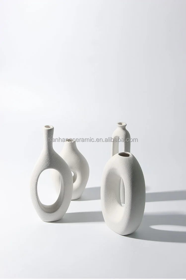 Custom Promotional Logo Nordic Modern White Ceramic Vase for Home Decor Desktop Interior Decorative Table Hollow Out Flower Vase.jpg