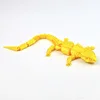 Lagarto dorado de 22,5 cm.