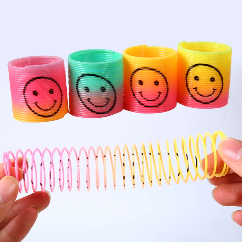 Оптовая продажа, Классическая новинка, игрушка для детей, отличные сувениры для вечеринок, большой размер, мини-размер, улыбающееся лицо, принт, красочная Волшебная Радуга, пружина