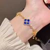 Oro + conchiglia blu