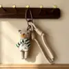 A27 green scarf bear
