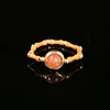 Olive Pit Bamboo Joint Gold Sunstone Lucky Bead Band