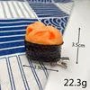 Épingle à cheveux sushi colorée en forme de petit oursin.