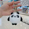 Panda gordito con ojos grandes + hebilla dorada - alto 8cm