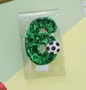 Candela numero 6 a forma di pallone da calcio
