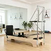 Brown oak pilates with tower