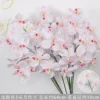 Orquídea Vanda de 3 cabezas rosa claro