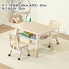 A table and two chairs in wood grain and wood color.