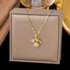Collana in acciaio inossidabile con stella, sole e luna tempestati di diamanti