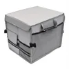 Caja de almacenamiento de 30 litros gris.