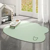 Tapis pour animaux de compagnie en cuir double face - forme de tête de chien minimaliste, vert clair