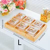 6-compartment transparent PET striped dish with gold and wood base