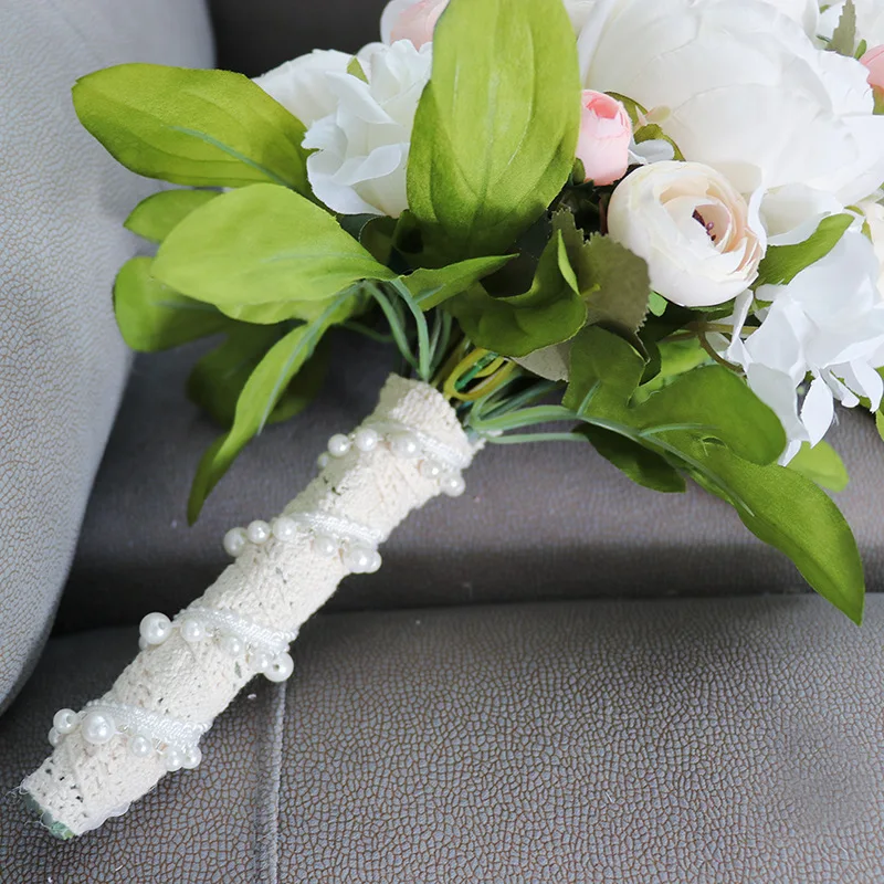 white hold flowers bridal bouquet holders