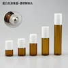 Amber bottle + steel roller ball + plastic white cap