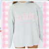 Silver, with pink letter
