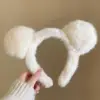 Beige plush ears
