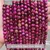 1A Perline di pietra occhi di tigre color fucsia tinte