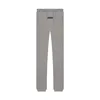 Pantalones oscuros de avena