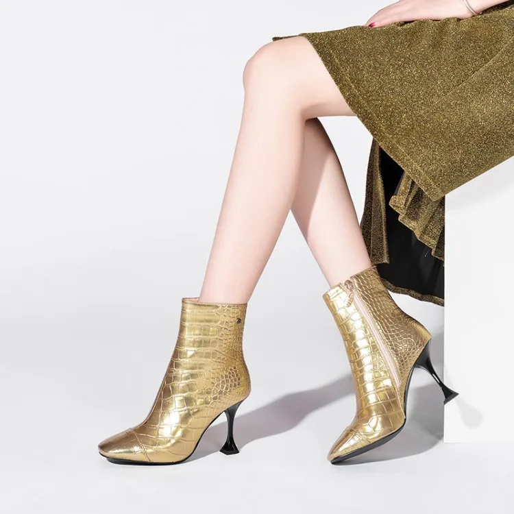 gold shiny boots