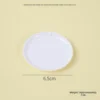 Plato blanco de 65 cm con agujeros.