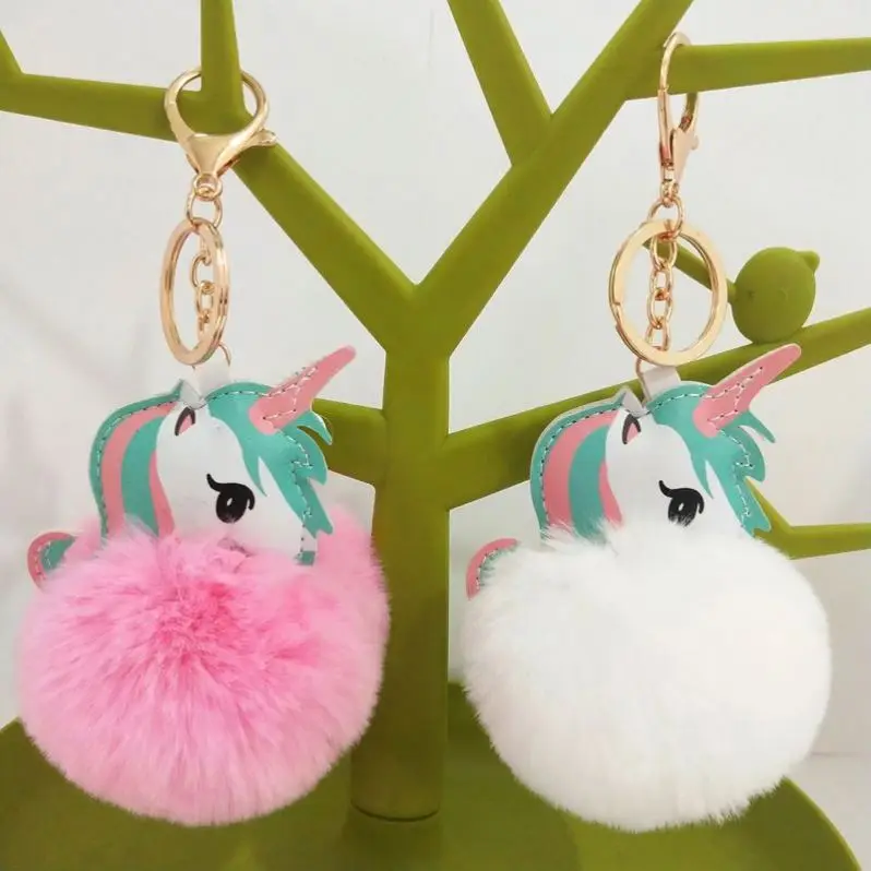 Muñecas llavero venta al por mayor unicornio piel sintética pompón bolas de  felpa llaveros al por mayor lujo felpa unicornio piel sintética pompón