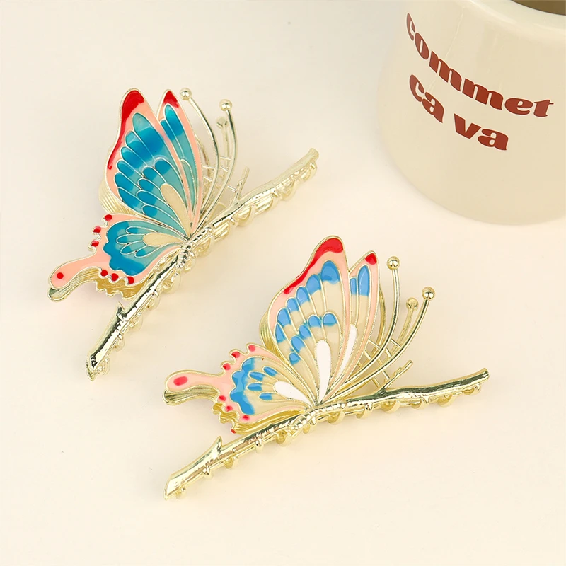 2025 New Style Color butterfly Metal Plating Painted Hair Claw Clip for Women Decorative Butterfly Ponytail Hair Claw Party Made