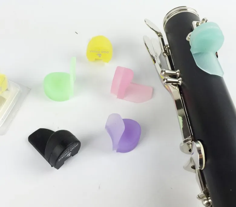 Wholesale High Quality cheap price silicon rubber color Clarinet accessories Thumb Rest Cushion for sale From m.alibaba.com
