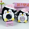 Sleeping penguin card holder